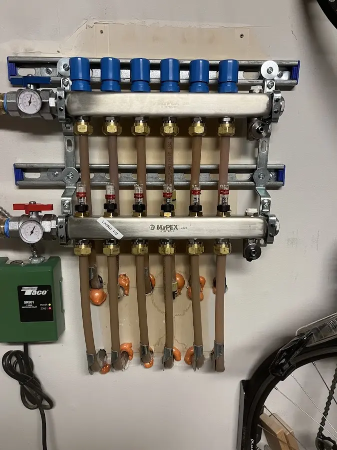 Plumber performing Water Heater Repair at a residential property in Potomac